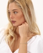Blissful Heart4Heart gold plated chain bracelet with white enamel and motif-