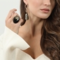Impress Me gold plated dangle earrings with motif-