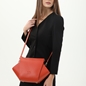 Irregular orange crossbody with zipper-